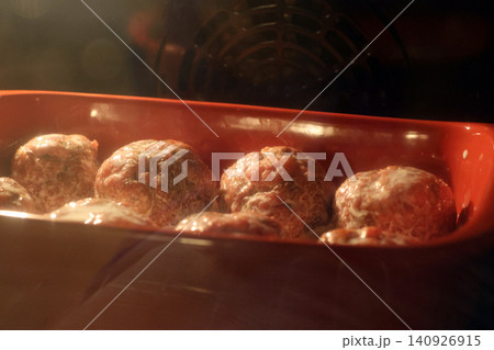 Homemade Meatballs Baking in Oven for Delicious Meal Preparation Homemade Meatballs Baking in Oven for Delicious Meal Preparation 140926915