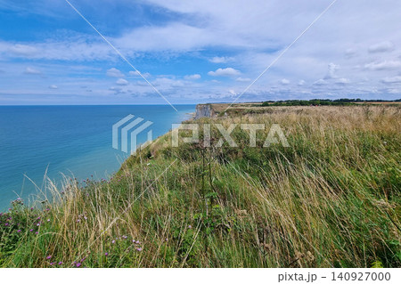 Scenic Coastal Cliffside with Grassy Meadow and Expansive Ocean View Scenic Coastal Cliffside with Grassy Meadow and Expansive Ocean View 140927000