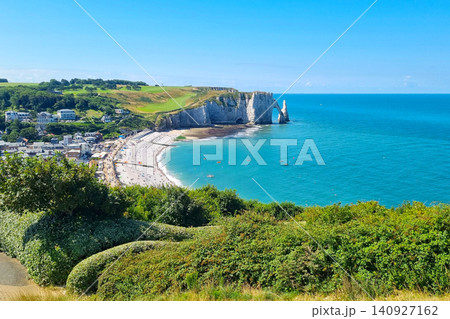Stunning Coastal Landscape of Etretat Cliffs and Azure Waters Stunning Coastal Landscape of Etretat Cliffs and Azure Waters 140927162