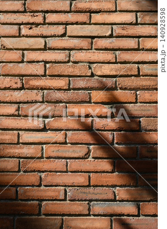 Red Brick Wall with Shadow Texture Background 140928598