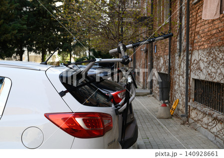 Rear car bike rack ready for cycling adventure Rear car bike rack ready for cycling adventure 140928661
