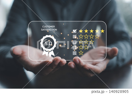 Close-up of a client's hand holding five stars Close-up of a client's hand holding five stars 140928905