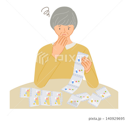 飲み忘れた処方薬を見て困るシニア女性 飲み忘れた処方薬を見て困るシニア女性 140929695