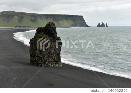 View of Reynisdrangar sea stacks and Reynisfjara beach from Dyrholaey Iceland View of Reynisdrangar sea stacks and Reynisfjara beach from Dyrholaey Iceland 140932292