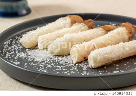 chinese Yam with Sugar Dip, Traditional Sweet Root Snack chinese Yam with Sugar Dip, Traditional Sweet Root Snack 140934033