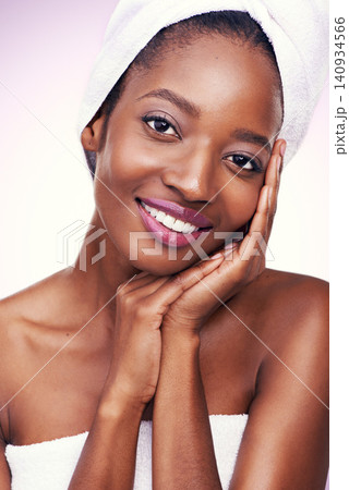 Woman, portrait and skin care in studio with beauty, dermatology and facial glow on a white background. Portrait of young model or African person in towel and smile for hygiene, cosmetics and makeup Woman, portrait and skin care in studio with beauty, dermatology and facial glow on a white background. Portrait of young model or African person in towel and smile for hygiene, cosmetics and makeup 140934566