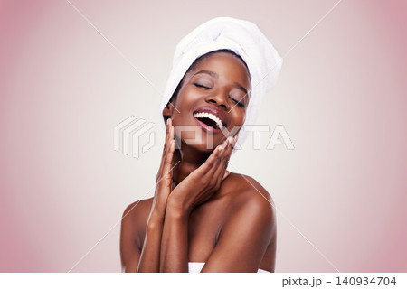 Black woman, skin care and natural for confidence, studio and wellness in fresh look with smile and face touch. African female person, cosmetic, and beautiful for anti age, body and happy beauty Black woman, skin care and natural for confidence, studio and wellness in fresh look with smile and face touch. African female person, cosmetic, and beautiful for anti age, body and happy beauty 140934704