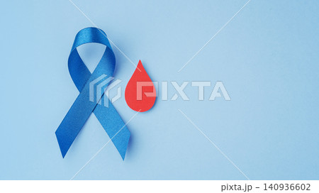 Blue ribbon with red blood drop on blue background with copy space, World Diabetes Day concept Blue ribbon with red blood drop on blue background with copy space, World Diabetes Day concept 140936602