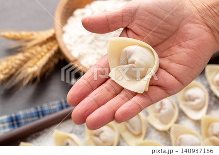handmade Wonton Wrapping Process, Traditional Chinese Dumpling Making handmade Wonton Wrapping Process, Traditional Chinese Dumpling Making 140937186