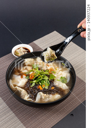 pork and Fennel Wontons in Light Broth, Traditional Chinese Dumplings pork and Fennel Wontons in Light Broth, Traditional Chinese Dumplings 140937224