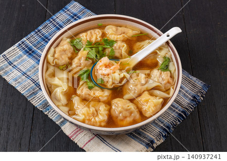 shrimp Wontons in Light Broth, Traditional Chinese Dumplings shrimp Wontons in Light Broth, Traditional Chinese Dumplings 140937241
