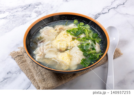 beef Wontons in Water Chestnut Soup, Traditional Chinese Dumpling Soup 140937255