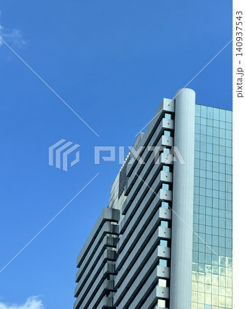 Luxury Apartment Facade With Glass Balustrades Mirroring Clouds 140937543