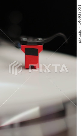 Vertical video Close-up of a vinyl record and a turntable needle. Vintage vinyl record player. Vertical video Close-up of a vinyl record and a turntable needle. Vintage vinyl record player. 140938051