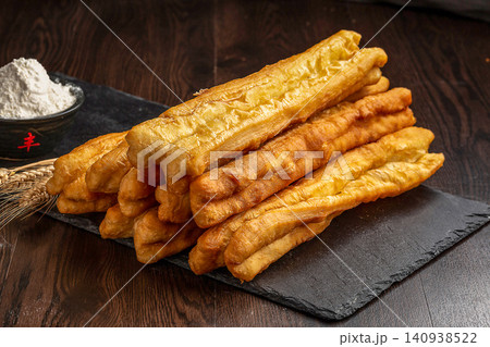 crispy Deep Fried Youtiao, Traditional Chinese Cruller and Breakfast Fried Dough Stick 140938522