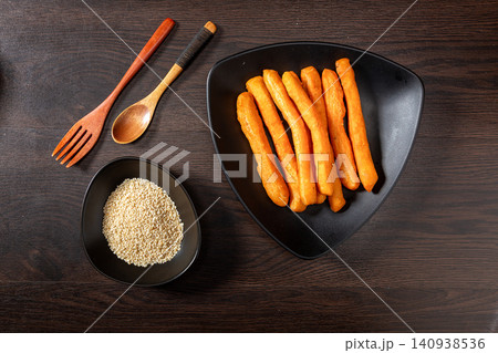 mini Fried Dough Sticks Made of Leavened Dough, Soft and Crispy Chinese Youtiao mini Fried Dough Sticks Made of Leavened Dough, Soft and Crispy Chinese Youtiao 140938536