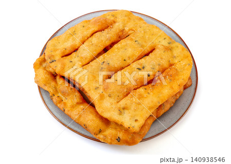 mini Fried Dough Sticks Seasoned with Sichuan Peppercorn Leaves, Aromatic Chinese Youtiao mini Fried Dough Sticks Seasoned with Sichuan Peppercorn Leaves, Aromatic Chinese Youtiao 140938546