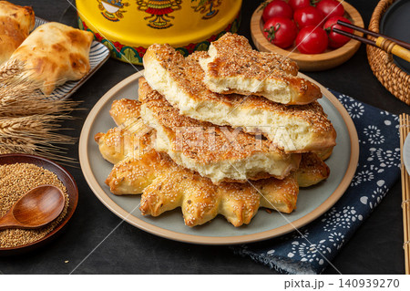 star Shaped Xinjiang Naan Flatbread, Traditional Roasted Sesame Flatbread from Silk Road star Shaped Xinjiang Naan Flatbread, Traditional Roasted Sesame Flatbread from Silk Road 140939270