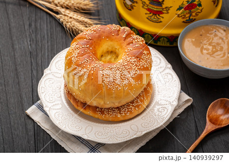 traditional Small Round Xinjiang Naan Flatbread, Roasted Sesame Bread of Silk Road traditional Small Round Xinjiang Naan Flatbread, Roasted Sesame Bread of Silk Road 140939297