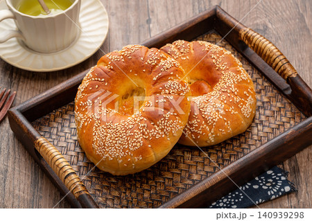 traditional Small Round Xinjiang Naan Flatbread, Roasted Sesame Bread of Silk Road traditional Small Round Xinjiang Naan Flatbread, Roasted Sesame Bread of Silk Road 140939298