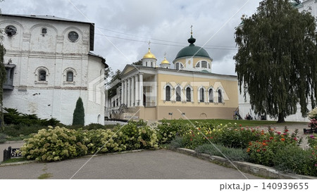 Orthodox monastery with garden and historical architecture under cloudy sky Orthodox monastery with garden and historical architecture under cloudy sky 140939655