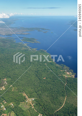 immensity of wide Negro river cutting through Amazon rainforest. Amazonas, Brazil immensity of wide Negro river cutting through Amazon rainforest. Amazonas, Brazil 140940065