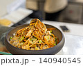 Close-up of a healthy salmon poke bowl with rice and sliced avocado 140940545