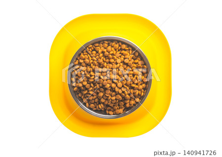 Top view of Dog and Cat food bowl with kibbles. Top view of Dog and Cat food bowl with kibbles. 140941726