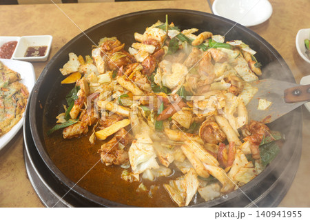 Raw Spicy Korean Chicken Stir Fry Dakgalbi with Vegetables Raw Spicy Korean Chicken Stir Fry Dakgalbi with Vegetables 140941955