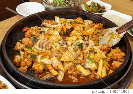 Raw Spicy Korean Chicken Stir Fry Dakgalbi with Vegetables 140941965