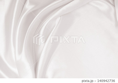 Smooth elegant golden silk or satin luxury cloth texture as wedding background. Luxurious background design. In Sepia toned. Retro style Smooth elegant golden silk or satin luxury cloth texture as wedding background. Luxurious background design. In Sepia toned. Retro style 140942736