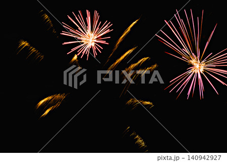 Fireworks lighting up the night sky. Pyrotechnics, abstract Fireworks lighting up the night sky. Pyrotechnics, abstract 140942927