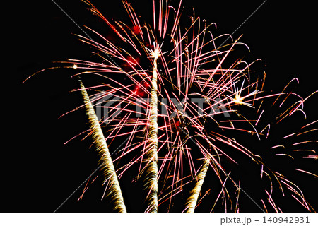 Fireworks lighting up the night sky. Pyrotechnics, abstract Fireworks lighting up the night sky. Pyrotechnics, abstract 140942931