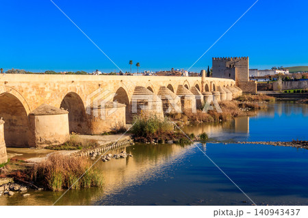Roman bridge over Guadalquivir river in Cordoba, Spain Roman bridge over Guadalquivir river in Cordoba, Spain 140943437