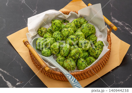 crispy Fried Chive Balls, Traditional Green Vegetable and Herb Dumpling Balls crispy Fried Chive Balls, Traditional Green Vegetable and Herb Dumpling Balls 140944238