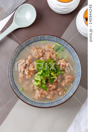 traditional Donkey Meatball Soup with Savory Broth and Fresh Coriander 140944248