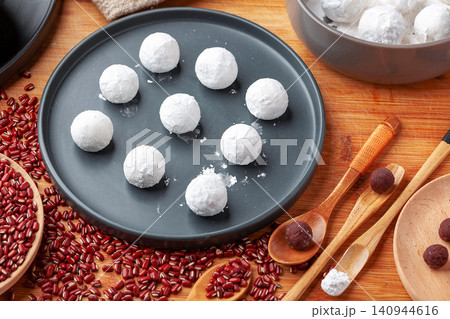 handmade raw sweet glutinous rice balls, freshly prepared Chinese Tangyuan mochi for festival handmade raw sweet glutinous rice balls, freshly prepared Chinese Tangyuan mochi for festival 140944616