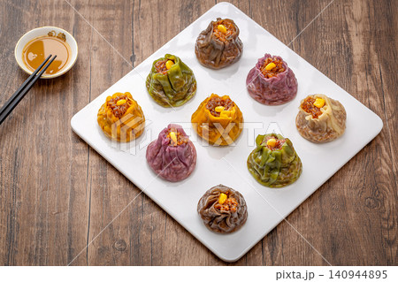 assorted multi flavor Chinese shumai dumplings, colorful steamed Siu Mai with mixed fillings, traditional asian dim sum assorted multi flavor Chinese shumai dumplings, colorful steamed Siu Mai with mixed fillings, traditional asian dim sum 140944895