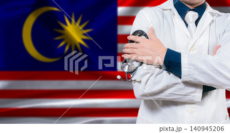 Malaysian national health system, Medical professional holding sthetoscope isolated Malaysian national health system, Medical professional holding sthetoscope isolated 140945206