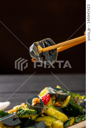 century Egg and Preserved Egg Sausage Smashed Cucumber Salad, Authentic Chinese Cold Appetizer with Garlic Sauce century Egg and Preserved Egg Sausage Smashed Cucumber Salad, Authentic Chinese Cold Appetizer with Garlic Sauce 140945423