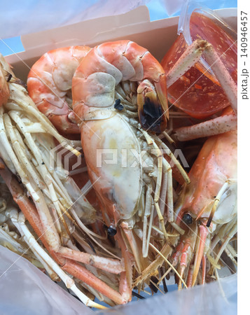 Shrimp crab seafood shellfish heap with cooked crustacean in market tray Shrimp crab seafood shellfish heap with cooked crustacean in market tray 140946457
