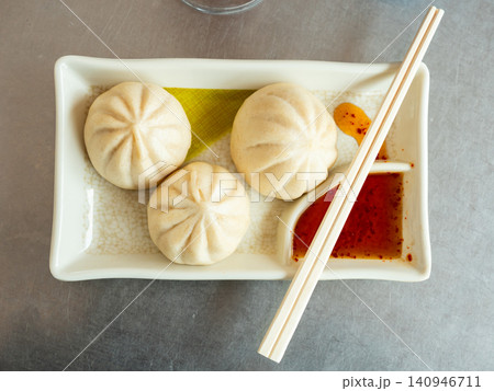 Pan chino are steamed buns. Traditional Chinese food Pan chino are steamed buns. Traditional Chinese food 140946711