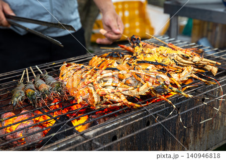 Grilled lobster and shrimp at a Vietnamese night market Grilled lobster and shrimp at a Vietnamese night market 140946818