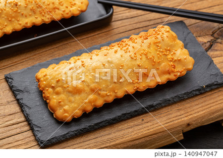 golden Pocket Flatbread, Chinese Stuffed Pita Style Bread, Crispy Street Food Snack 140947047
