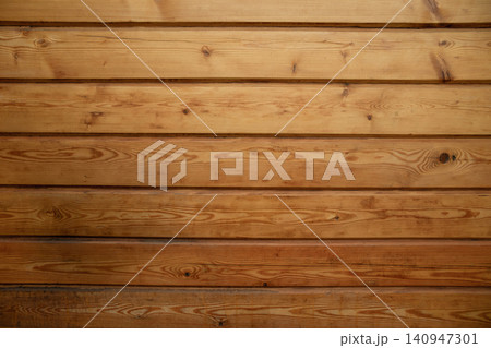 Wooden planks form a rustic backdrop with rich textures and colors Wooden planks form a rustic backdrop with rich textures and colors 140947301