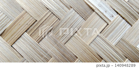 Natural woven bamboo texture with a traditional handmade pattern. Natural woven bamboo texture with a traditional handmade pattern. 140948289