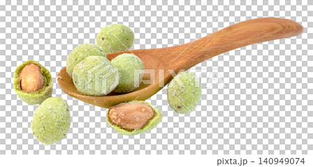 Wasabi coated peanuts in a wooden spoon and scattered. Spicy green snack with crunchy coating showing whole and halved nuts. Healthy legumes for appetizer or party food. 140949074