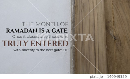 Inspirational quote text overlays a white textured wall next to a vertical wooden frame. The message discusses the spiritual significance of Ramadan, describing it as a gate leading toward Eid. This 140949529