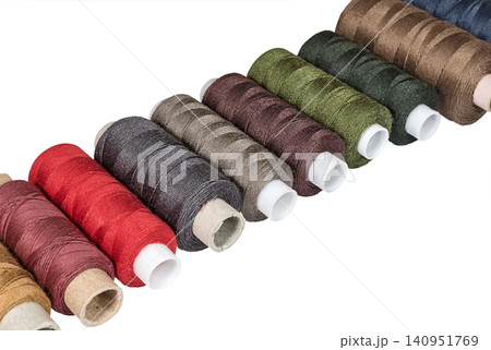 Multicolored sewing threads bobbins Multicolored sewing threads bobbins 140951769