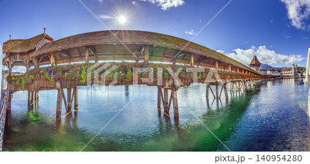 Panoramic Chapel Bridge with Flowers in Lucerne Switzerland 140954280